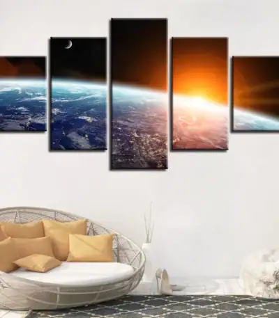 Vue spectaculaire de la Terre depuis l'espace avec le Soleil levant à l'horizon, illustrant la beauté de notre planète et l'immensité de l'univers.
