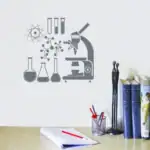 Illustration de matériel de laboratoire et d'objets de décoration scientifique, incluant un microscope, des fioles, et des livres, parfait pour une décoration thématique scientifique.