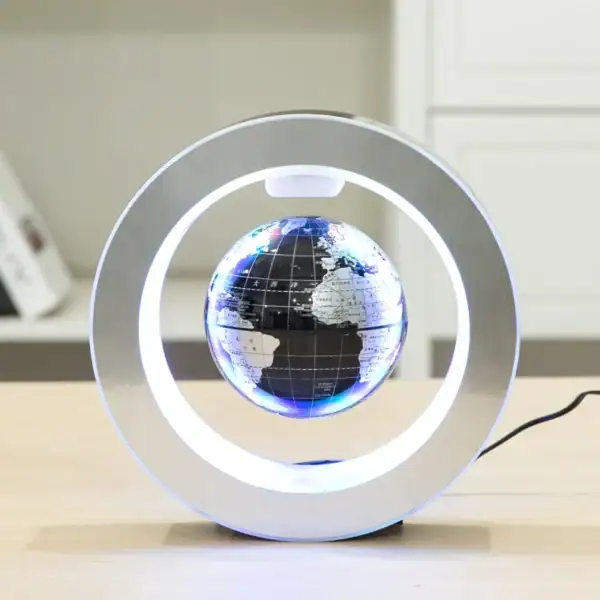 Objet scientifique lumineux représentant la Terre dans un cadre circulaire.