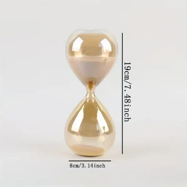 Porte-sablier en verre transparent avec sable beige, mesurant 19 cm de haut et 8 cm de large, idéal pour la décoration scientifique ou comme objet de bureau original.