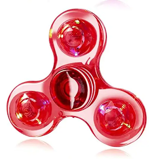Jouet en verre rouge en forme de toupie, décoratif et coloré, parfait pour la décoration ou comme objet de collection.