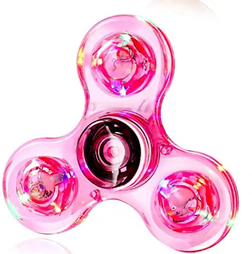 Fidget spinner lumineux rose en plastique transparent avec LED intégrées, idéal pour la détente et le divertissement, parfait comme objet de décoration scientifique ou gadget.