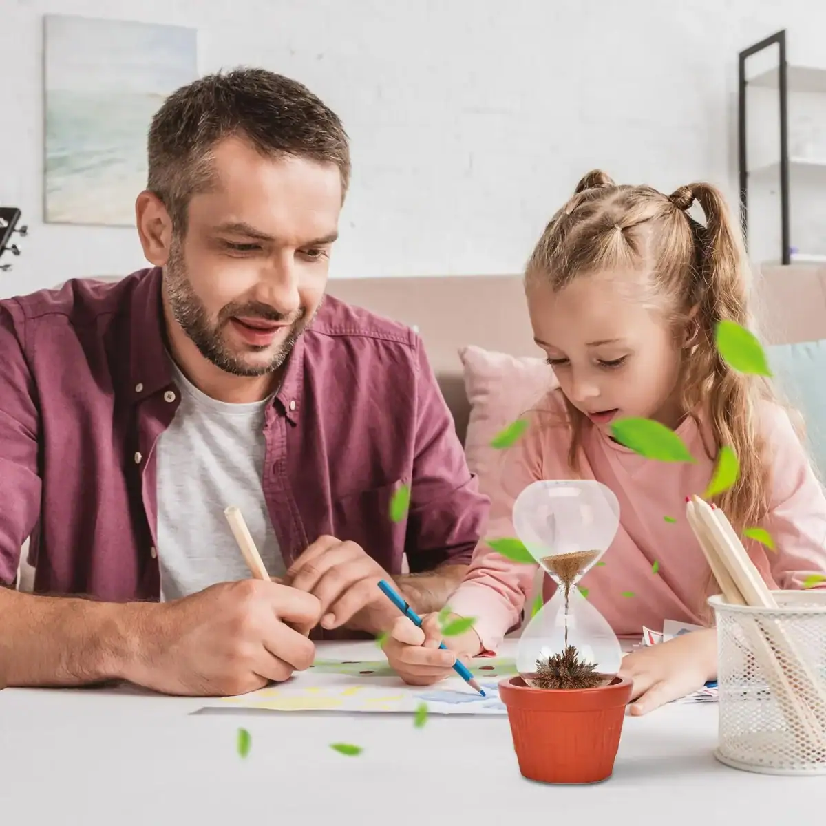 Un père et sa fille réalisent une expérience scientifique à la maison avec un terrarium, un verre à expérience et des feuilles vertes, favorisant l'apprentissage ludique.