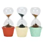 Sablier de sable décoratif avec plantes en pot, idéal pour la décoration scientifique ou botanique, en trois couleurs : rouge, beige et vert.