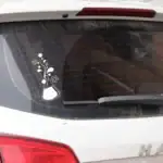 Décoration de voiture avec sticker scientifique représentant une pipette et des fleurs, idéale pour les amateurs de sciences et de décoration originale.