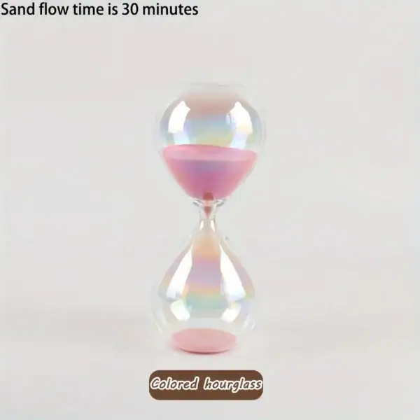 Un sablier coloré en verre avec du sable rose, illustrant un temps de flux de sable de 30 minutes.