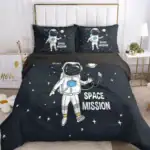 Ensemble de literie avec motif d'astronaute et d'espace, parfait pour une chambre d'enfant ou d'adolescent passionné par l'espace et l'univers.