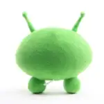 Peluche d'alien verte en forme d'objet scientifique, douce et adorable, idéale pour la décoration ou comme cadeau original.