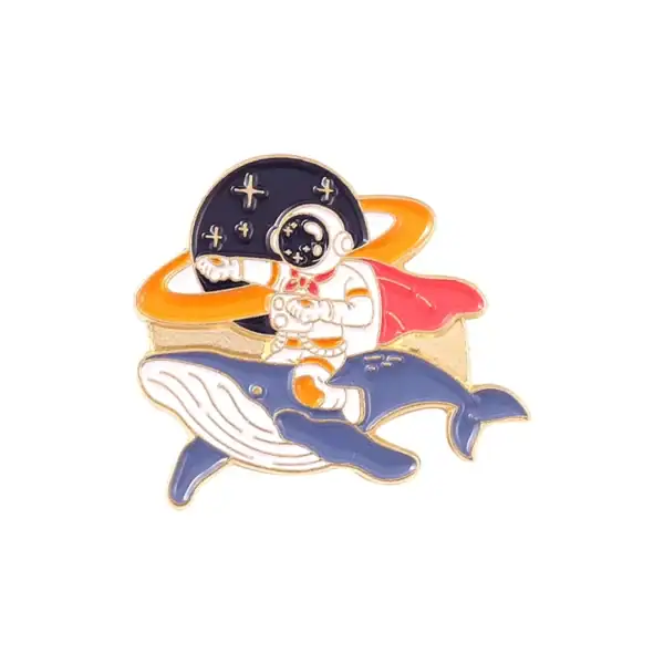 Pin's astronaute et baleine, décoration scientifique et marine.