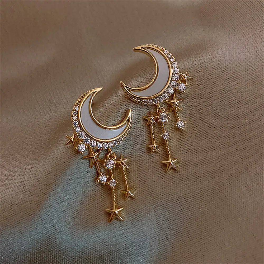 Bijoux lune et étoiles avec cristaux pour un style élégant et mystique.