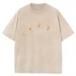 T-shirt beige avec motifs de phases de la lune, style décontracté et tendance.