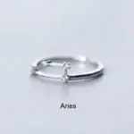 Anneau zodiacal Aries en argent avec cristaux, symbole du signe astrologique, parfait pour les amateurs d'astrologie et de bijoux personnalisés.