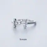 Bague en forme de constellation du Scorpion ornée de petites pierres brillantes, symbole de la constellation du Scorpion, idéale pour les amateurs d'astrologie et de bijoux originaux.