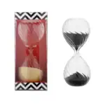 Sablier décoratif en verre noir et blanc, symbole du temps, idéal pour la décoration intérieure ou comme objet de collection.