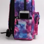 Sac à dos galaxie avec poche pour téléphone portable, design coloré et cosmique.