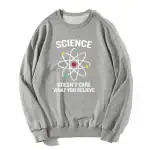 Pull scientifique avec motif atome et slogan inspirant.