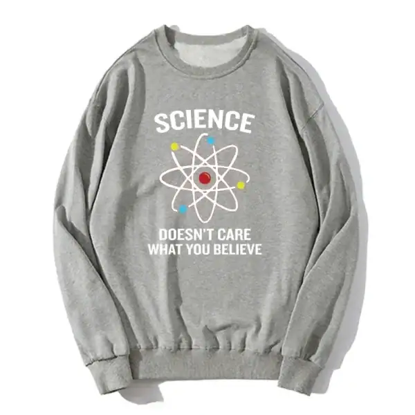 Pull scientifique avec motif atome et slogan inspirant.