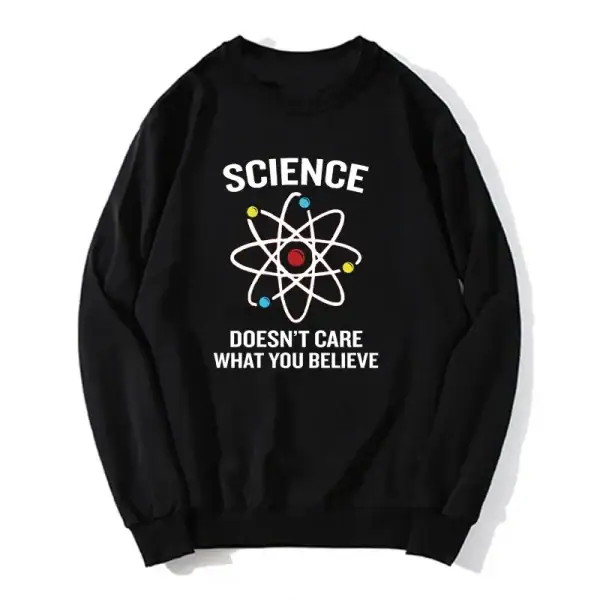 Sweatshirt noir avec motif atomique et texte "Science doesn't care what you believe" pour passionnés de science et décoration geek.