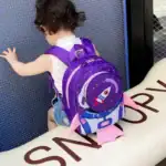 Sac à dos enfant avec motif de fusée spatiale, parfait pour l'école ou les activités ludiques.