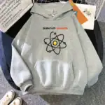 Sweat à capuche gris avec motif atomique et texte "Quantum Physics" pour les amateurs de sciences et de physique quantique.