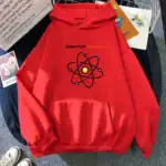 Veste à capuche rouge avec motif atomique et texte "Quantum Physics" pour passionnés de sciences. Confortable et stylée, idéale pour les amateurs de physique quantique.