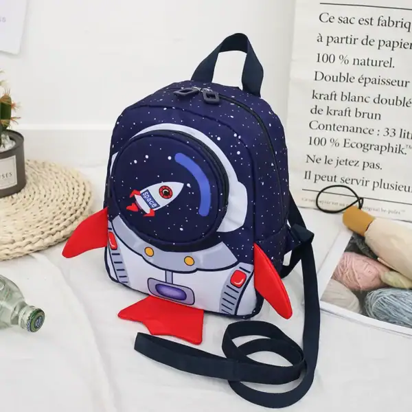 Sac à dos enfant thème spatial, design astronautique avec fusée et étoiles.