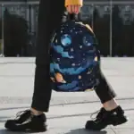 Sac à dos avec motif d'espace et planètes.