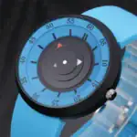 Montre scientifique pour enfants avec cadran coloré et aiguilles mobiles, idéale pour apprendre à lire l'heure tout en découvrant la science.