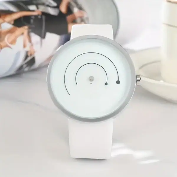 Montre moderne avec affichage circulaire blanc et aiguilles noires, design épuré et élégant, idéale pour une décoration scientifique ou un accessoire tendance.
