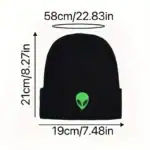 Balaclava noire avec logo extraterrestre vert, idéale pour accessoires de science-fiction ou décoration thématique.