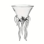 Vase en verre transparent avec des tentacules décoratives suspendues, idéal pour une décoration scientifique ou marine.