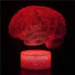 Objet scientifique lumineux en forme de cerveau, avec un design en lignes rouges sur fond noir.