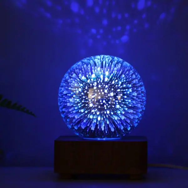 Lampe LED décorative en forme de boule avec effets lumineux étoilés bleus. Parfaite pour la décoration intérieure ou comme objet scientifique lumineux.
