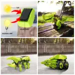 Panneau solaire avec lampe halogène et robot de jardinage en forme de dinosaure, tous deux alimentés par énergie solaire, dans un environnement extérieur ensoleillé.