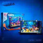 Aquarium scientifique Atlantis World avec 725 pièces, parfait pour les amateurs de sciences et de décoration, offrant un univers marin coloré et éducatif.