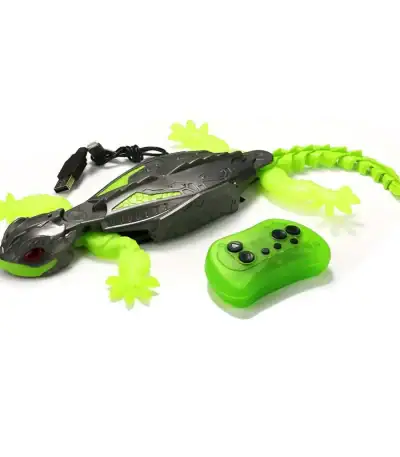 Robot crocodile télécommandé avec queue lumineuse verte, contrôleur sans fil, idéal pour jouets éducatifs et divertissement pour enfants.