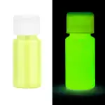 Flacon de peinture phosphorescente verte visible en lumière normale et qui brille dans l'obscurité, parfait pour décoration ou projets créatifs lumineux.
