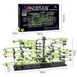 Jeu de construction de circuit de train spatial lumineux, modèle SpaceRail, avec rails lumineux verts et structure noire, pour enfants et passionnés de science.