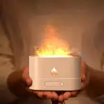 Diffuseur d'huiles essentielles avec flammes LED, créant une atmosphère apaisante et chaleureuse dans votre intérieur.