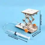 Support de laboratoire en bois avec mécanisme articulé, hauteur 10 cm, largeur 8 cm, profondeur 11 cm, livré avec pipette en plastique.