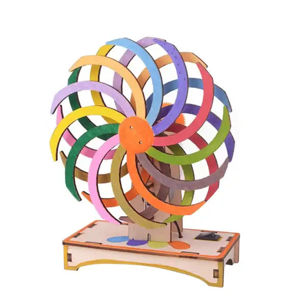 Modèle de roue de Newton en bois peint en couleurs vives, illustrant le principe de la conservation de l'énergie par mouvement rotatif.