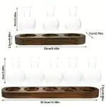 Balustre en verre avec plateau en bois pour présentation d'échantillons.