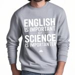 Sweat-shirt gris avec message humoristique sur l'importance de la science par rapport à l'anglais, idéal pour les amateurs de sciences et d'humour.