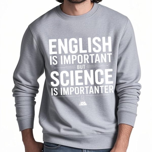 Sweat-shirt gris avec message humoristique sur l'importance de la science par rapport à l'anglais, idéal pour les amateurs de sciences et d'humour.