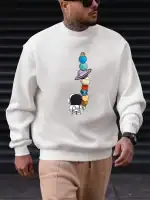 Sweat-shirt avec illustration d'un explorateur spatial regardant une tour de planètes en équilibre.