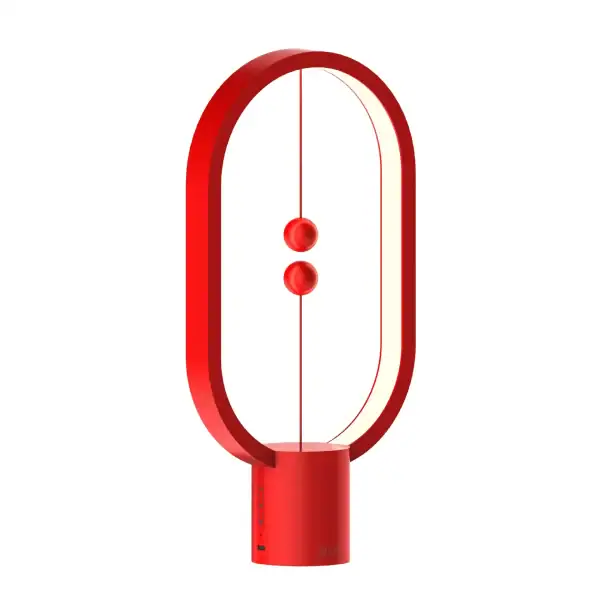 Lampe de bureau design en forme d'atome avec deux sphères rouges représentant un modèle scientifique, idéale pour une décoration moderne et éducative.